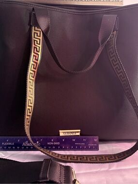 Versace Black Tote with Gold Greek Trim. Comes with detachable pouch. Brand new.